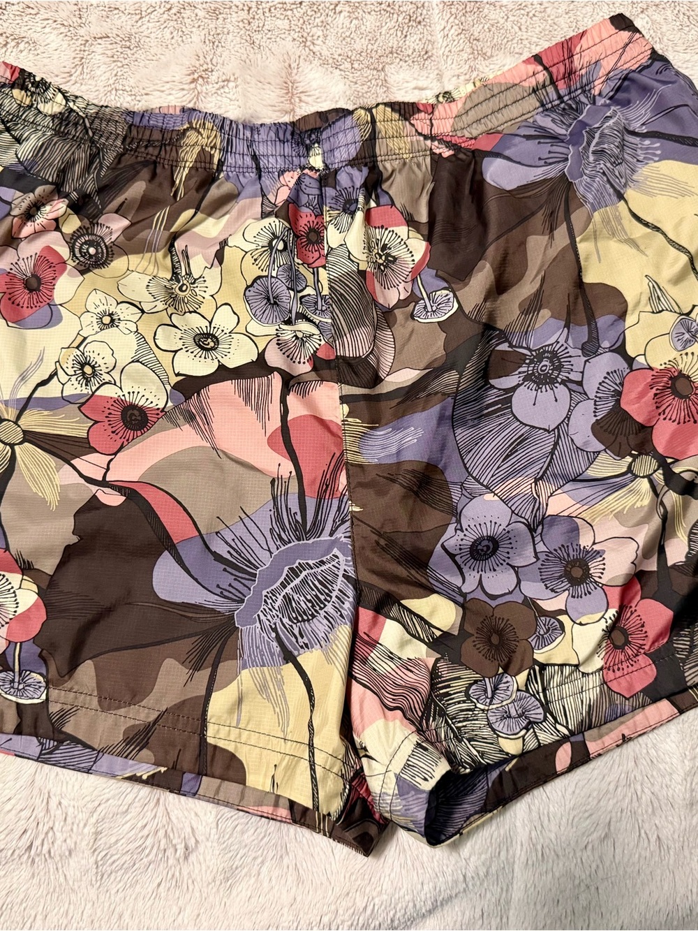 Nike Women's Floral Athletic Shorts in Pink, Purple, Yellow, Brown